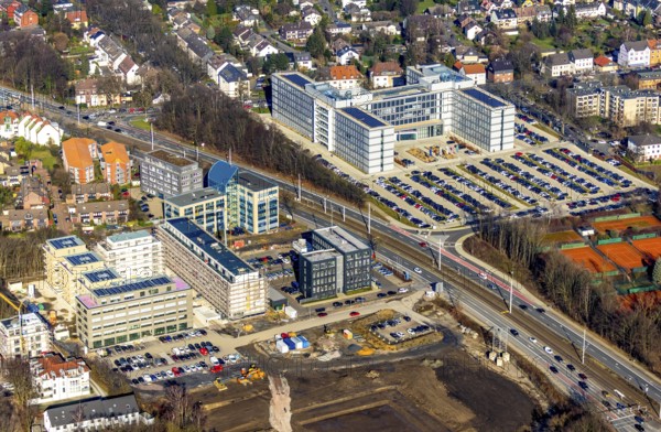 Aerial view, construction site and new construction residential quarter Seven Stones, office building Vonovia, Universitätsstraße, Wiemelhausen, Bochum, Ruhr area, North Rhine-Westphalia, Germany, 7 Stones, DEU, Europe, real estate, aerial view, aerial photography, aerial photography, car parks, Seven Stones, overview, bird's eye view, residential complex, housing and living, residential buildings, residential quarter Seven Stones Bochum, housing estate, housing shortage, birds-eyes view, overview