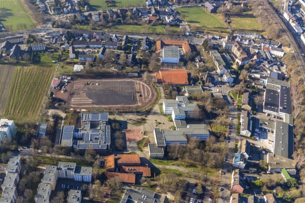 Aerial view, sports centre Westenfeld, construction site sports field, primary school Westenfeld, Hellweg-Schule Städt. Gymnasium, Maria-Sibylla-Merian-Gesamtschule, St.Nikolaus Kindergarten, Westenfeld, Bochum, Ruhr area, North Rhine-Westphalia, Germany, education, educational institution, DE, Europe, comprehensive school, primary school, primary tax, grammar school, real estate, kindergarten, teaching institute, aerial photograph, aerial photography, aerial photography, school, overview, bird's eye view, residential complex, living and life, residential area, residential buildings, housing estate, birds-eyes view, overview