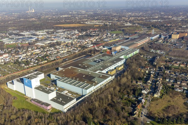 Aerial view, thyssenkrupp Steel Europe AG Bochum plant, Essener Straße, Kruppwerke, Bochum, Ruhr area, North Rhine-Westphalia, Germany, DE, Europe, commercial area, commercial use, property tax, real estate, industrial plants, industrial area, industrial site, aerial photograph, aerial photography, aerial photography, production plants, production halls, steel manufacturer, overview, bird's-eye view, living and working, living and life, residential area, residential buildings, birds-eyes view, overview