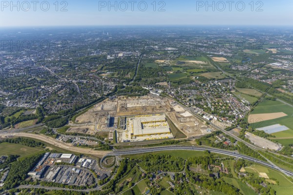 Aerial view, new construction DHL logistics parcel centre, former Opel site, former Opel administration building, Laer district, Bochum, Ruhr area, North Rhine-Westphalia, Germany, expansion areas, A448 motorway, construction, construction area, construction site, construction project, construction site, DE, DHL, DHL logistics, DHL parcel centre, earthworks, Renewal, development, Europe, Mark 51/7 industrial estate, capacity requirements, logistics, aerial view, aerial photography, aerial photography, new build, Opel site, Opelring 1, overview, bird's-eye view, growth, becoming and growing, birds-eyes view, former Opel site with old administration building, overview