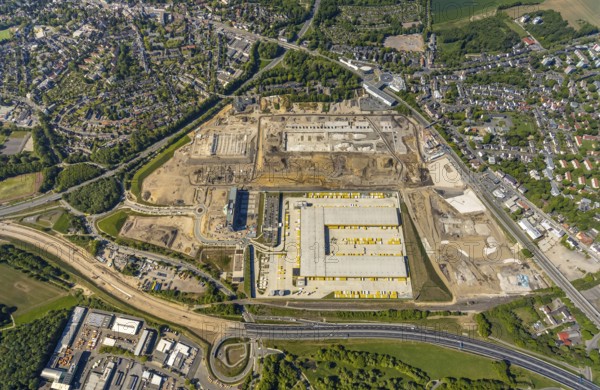 Aerial view, new construction DHL logistics parcel centre, former Opel site, former Opel administration building, Laer district, Bochum, Ruhr area, North Rhine-Westphalia, Germany, expansion areas, A448 motorway, construction, construction area, construction site, construction project, construction site, DE, DHL, DHL logistics, DHL parcel centre, earthworks, Renewal, development, Europe, distant view, Mark 51/7 industrial estate, capacity requirements, logistics, aerial view, aerial photography, aerial photography, new build, Opel site, Opelring 1, overview, bird's-eye view, growth, becoming and growing, birds-eyes view, former Opel site with old administration building, overview