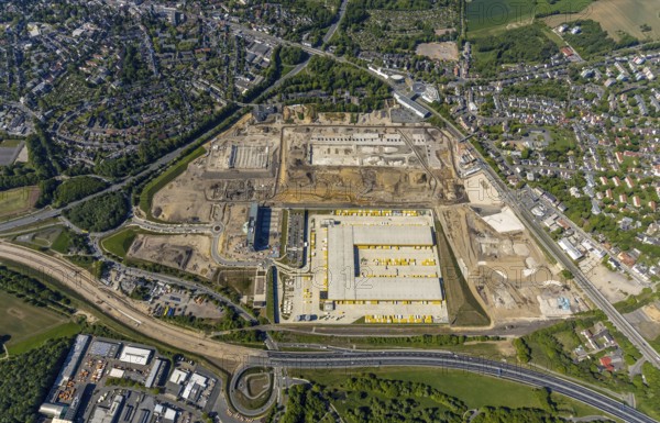 Aerial view, new construction DHL logistics parcel centre, former Opel site, former Opel administration building, Laer district, Bochum, Ruhr area, North Rhine-Westphalia, Germany, expansion areas, A448 motorway, construction, construction area, construction site, construction project, construction site, DE, DHL, DHL logistics, DHL parcel centre, earthworks, Renewal, development, Europe, distant view, Mark 51/7 industrial estate, capacity requirements, logistics, aerial view, aerial photography, aerial photography, new build, Opel site, Opelring 1, overview, bird's-eye view, growth, becoming and growing, birds-eyes view, former Opel site with old administration building, overview