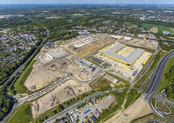 Aerial view, new construction DHL logistics parcel centre, former Opel site, former Opel administration building, Laer district, Bochum, Ruhr area, North Rhine-Westphalia, Germany, expansion areas, A448 motorway, construction, construction area, construction site, construction project, construction site, DE, DHL, DHL logistics, DHL parcel centre, earthworks, Renewal, development, Europe, Mark 51/7 industrial estate, capacity requirements, logistics, aerial view, aerial photography, aerial photography, new build, Opel site, Opelring 1, overview, bird's-eye view, growth, becoming and growing, birds-eyes view, former Opel site with old administration building, overview