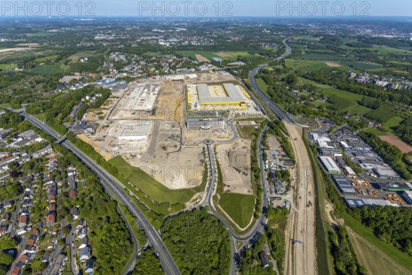 Aerial view, new construction DHL logistics parcel centre, former Opel site, former Opel administration building, Laer district, Bochum, Ruhr area, North Rhine-Westphalia, Germany, expansion areas, A448 motorway, construction, construction area, construction site, construction project, construction site, DE, DHL, DHL logistics, DHL parcel centre, earthworks, Renewal, development, Europe, Mark 51/7 industrial estate, capacity requirements, logistics, aerial view, aerial photography, aerial photography, new build, Opel site, Opelring 1, overview, bird's-eye view, growth, becoming and growing, birds-eyes view, former Opel site with old administration building, overview