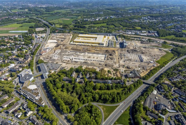 Aerial view, new construction DHL logistics parcel centre, former Opel site, former Opel administration building, Laer district, Bochum, Ruhr area, North Rhine-Westphalia, Germany, expansion areas, A448 motorway, construction, construction area, construction site, construction project, construction site, DE, DHL, DHL logistics, DHL parcel centre, earthworks, Renewal, development, Europe, distant view, Mark 51/7 industrial estate, capacity requirements, logistics, aerial view, aerial photography, aerial photography, new build, Opel site, Opelring 1, overview, bird's-eye view, growth, becoming and growing, birds-eyes view, former Opel site with old administration building, overview
