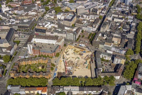 Aerial view, construction site and new building for three-part commercial building complex Viktoria Karree, Viktoriastraße, former justice centre, Bochum, Ruhr area, North Rhine-Westphalia, Germany, construction work, construction vehicles, construction area, construction site, building plots, construction crane, construction measure, construction project, construction site, DE, Europe, Husemannplatz, aerial view, aerial photography, aerial photography, new building, RuhrCongress Bochum Verwaltungs-GmbH, overview, Viktoria Karree, bird's eye view, birds-eyes view, overview