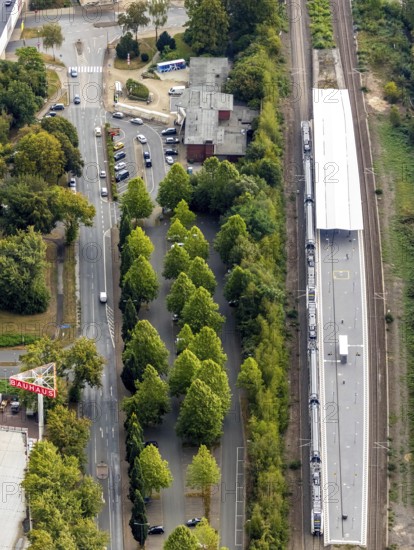 Aerial view, Wattenscheid railway station, motorway exit Bochum-Wattenscheid, Westenfeld, Bochum, Ruhr area, North Rhine-Westphalia, Germany, motorway A40, railway tracks, railway station, station forecourt, Bochum-Wattenscheid, DE, Deutsche Bahn AG, Europe, green trees, main station, aerial view, aerial photography, aerial photography, Wattenscheid district, overview, bird's eye view, Wattenscheid, birds-eyes view, overview