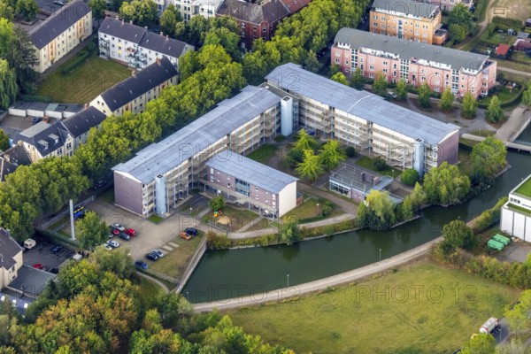 Aerial view, retirement home Weststraße, housing estate at the pond Weststraße, Leithe, Bochum, Ruhr area, North Rhine-Westphalia, Germany, retirement home, care and nursing, Bochum-Wattenscheid, DE, Europe, aerial view, aerial photography, aerial photography, care facility, lake, retirement home, retirement residence, retirement home, retirement centre, district Wattenscheid, pond, overview, bird's eye view, Wattenscheid, birds-eyes view, overview