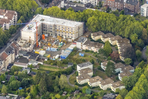 Aerial view, residential quarter with care facility Am Beisenkamp, Wattenscheid, Bochum, Ruhr area, North Rhine-Westphalia, Germany, construction work, building, building area, building site, building plots, building crane, construction project, building site, Bochum-Wattenscheid, DE, Europe, property tax, green trees, real estate, capacity requirements, Koschany und Zimmer Architekten KZA, aerial view, aerial photography, aerial photography, new building, Parkstraße, Wattenscheid district, overview, bird's-eye view, growth, becoming and growing, housing estate, living and living, residential area, residential buildings, residential quality, residential neighbourhood, housing estate, birds-eyes view, overview