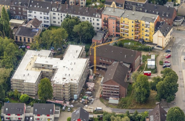 Aerial view, construction site new building Ludwig-Steil-Haus, senior centre, Wattenscheid, Bochum, Ruhr area, North Rhine-Westphalia, Germany, retirement home, construction work, building, construction area, building site, building plot, building crane, construction project, construction site, care and nursing, Bochum-Wattenscheid, DE, monument protection, Europe, aerial view, aerial photography, aerial photography, new building, nursing facility, retirement home, retirement residence, retirement home, senior centre Ludwig-Steil GmbH & Co. KG, Wattenscheid district, overview, bird's-eye view, birds-eyes view, overview