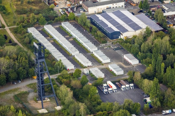 Aerial view, refugee accommodation at the former Holland colliery, Leithe, Bochum, Ruhr area, North Rhine-Westphalia, Germany, Bochum-Wattenscheid, DE, Former Holland colliery, Emil-Weitz-Straße, Europe, refugees, winding tower, commercial enterprises, commercial area, commercial park, commercial site, commercial use, industrial area, industrial site, aerial photograph, aerial photography, aerial photography, Plan B Ruhr e.V., Wattenscheid district, overview, bird's-eye view, Wattenscheid, residential container, Zipp Industries Maschinenbau, birds-eyes view, overview