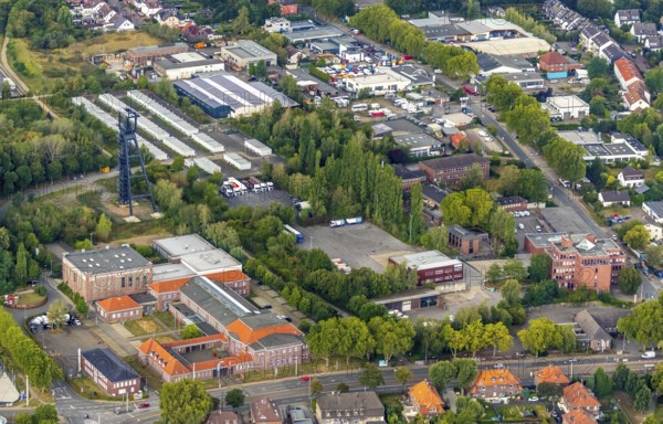 Aerial view, Lohrheidestrasse industrial estate, Wattenscheid technology and start-up centre, refugee accommodation at the former Holland colliery, Leithe, Bochum, Ruhr area, North Rhine-Westphalia, Germany, B & W Druck & Marketing GmbH, Bochum-Wattenscheid, DE, Former Holland colliery, Emil-Weitz-Straße, Europe, refugees, winding tower, commercial enterprises, commercial area, commercial area, commercial park, commercial location, commercial use, industrial area, industrial location, aerial photograph, aerial photography, aerial photography, Lyrenstraße, Plan B Ruhr e.V., Wattenscheid district, technology centre, overview, bird's-eye view, Wattenscheid, residential container, birds-eyes view, overview