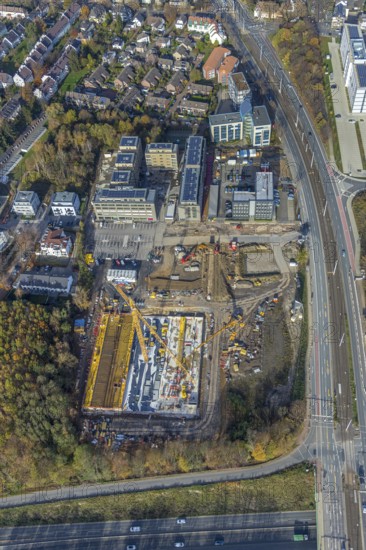 Police Bochum police station south-east, construction site new building residential neighbourhood Seven Stones, Universitätsstraße, Bochum, North Rhine-Westphalia, Germany, 7 Stones, construction work, construction, construction area, building site, building plots, construction project, construction site, DE, Europe, real estate, climate protection settlement, aerial photograph, aerial photo, aerial photography, aerial photography, apartment buildings, new construction, photovoltaics, Ruhr area, Seven Stones, solar plant, solar energy, overview, bird's-eye view, housing estate, housing and living, residential buildings, residential neighbourhood, residential neighbourhood Seven Stones Bochum, housing estate, housing shortage, birds-eyes view, overview