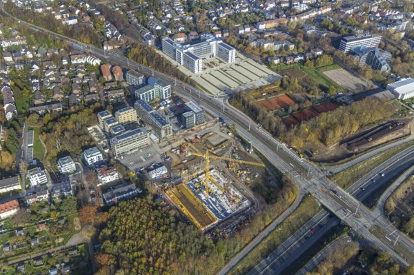 Police Bochum police station south-east, construction site new building residential neighbourhood Seven Stones, Universitätsstraße, Bochum, North Rhine-Westphalia, Germany, 7 Stones, construction work, construction, construction area, building site, building plots, construction project, construction site, DE, Europe, real estate, climate protection settlement, aerial photograph, aerial photo, aerial photography, aerial photography, apartment buildings, new construction, photovoltaics, Ruhr area, Seven Stones, solar plant, solar energy, overview, bird's-eye view, housing estate, housing and living, residential buildings, residential neighbourhood, residential neighbourhood Seven Stones Bochum, housing estate, housing shortage, birds-eyes view, overview