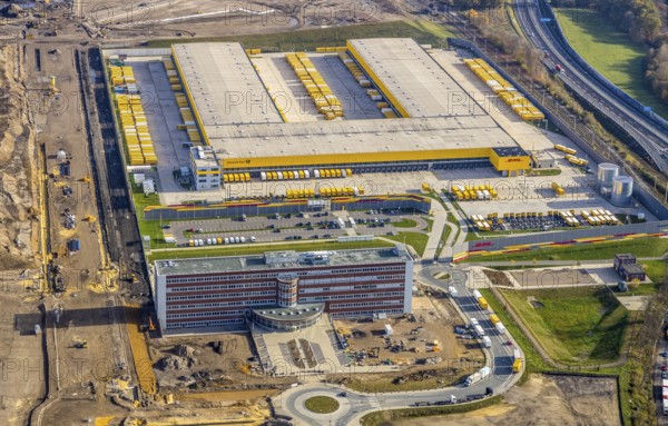 Construction site, new construction DHL Logistik, former Opel site, former Opel administration building, Laer, Bochum, North Rhine-Westphalia, Germany, expansion areas, construction work, building plots, construction measure, DE, monument protection, earthworks, renewal, development, Europe, commercial enterprises, commercial area, commercial park, commercial site, commercial use, freight transport, industrial area, industrial building, industrial site, capacity requirements, logistics, logistics service, logistics service provider, logistics provider, logistics centre, aerial view, aerial photograph, aerial photography, aerial photography, MARK 51°7, Mark 51/7, Opelring, Ruhr area, freight forwarding, transport, transport service, overview, bird's-eye view, growth, becoming and growing, birds-eyes view, overview