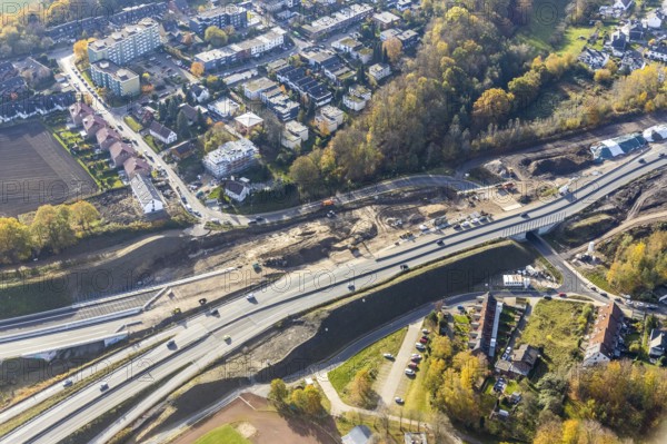 Construction of the feeder road from the A44 now 448 to the Nordhausen-Ring district of Laer, Bochum, North Rhine-Westphalia, Germany, construction, construction site, construction project, construction site, DE, renewal, development, Europe, property tax, green trees, dog sports club, real estate, aerial photograph, aerial photograph, aerial photography, aerial photography, Nordhausen-Ring, Ruhr area, sports, sports facilities, sports field, sports facility, Steinkuhlstraße, road construction, road traffic, overview, traffic, traffic volume, bird's-eye view, competition, living and life, residential buildings, birds-eyes view, overview