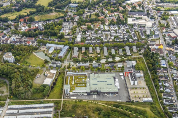 Aerial view, Refugee accommodation at the former Holland colliery, Weststraße retirement home, Weststraße pond housing estate, Leithe, Bochum, Ruhr area, North Rhine-Westphalia, Germany, Retirement home, Care and nursing, Bochum-Wattenscheid, DE, Former Holland colliery, Emil-Weitz-Straße, Europe, refugees, winding tower, commercial enterprises, commercial area, commercial area, commercial location, commercial use, industrial area, industrial location, aerial photograph, aerial photography, aerial photography, care facility, Plan B Ruhr e.V., lake, retirement home, retirement residence, retirement home, retirement centre, Wattenscheid district, pond, overview, bird's-eye view, Wattenscheid, residential container, Zipp Industries Maschinenbau, birds-eyes view, overview