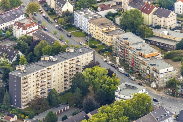 Aerial view, construction site, new residential complex Marienstraße corner Hüllerstraße, Wattenscheid, Bochum, Ruhr area, North Rhine-Westphalia, Germany, construction work, building, construction area, building site, building plots, construction project, construction site, Bochum-Wattenscheid, DE, Europe, property tax, real estate, aerial view, aerial photography, aerial photography, new building, Wattenscheid district, overview, bird's-eye view, housing estate, living and living, residential area, residential buildings, residential quality, residential neighbourhood, housing estate, birds-eyes view, overview