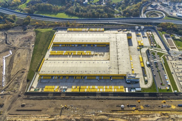 Construction site, new construction DHL Logistik, former Opel site, Laer, Bochum, North Rhine-Westphalia, Germany, expansion areas, construction work, building plots, construction measure, DE, earthworks, renewal, development, Europe, commercial enterprises, commercial area, commercial park, commercial site, commercial use, freight transport, industrial area, industrial building, industrial site, capacity requirements, logistics, logistics service, logistics service provider, logistics provider, logistics centre, aerial view, aerial photograph, aerial photography, aerial photography, MARK 51°7, Mark 51/7, Opelring, Ruhr area, freight forwarding, transport, transport service, overview, bird's-eye view, growth, becoming and growing, birds-eyes view, overview