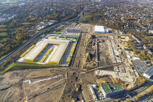 Construction site, new construction DHL Logistik, former Opel site, former Opel administration building, Laer, Bochum, North Rhine-Westphalia, Germany, expansion areas, construction work, building plots, construction measure, DE, monument protection, earthworks, renewal, development, Europe, commercial enterprises, commercial area, commercial park, commercial site, commercial use, freight transport, industrial area, industrial building, industrial site, capacity requirements, logistics, logistics service, logistics service provider, logistics provider, logistics centre, aerial view, aerial photograph, aerial photography, aerial photography, MARK 51°7, Mark 51/7, Opelring, Ruhr area, freight forwarding, transport, transport service, overview, bird's-eye view, growth, becoming and growing, birds-eyes view, overview