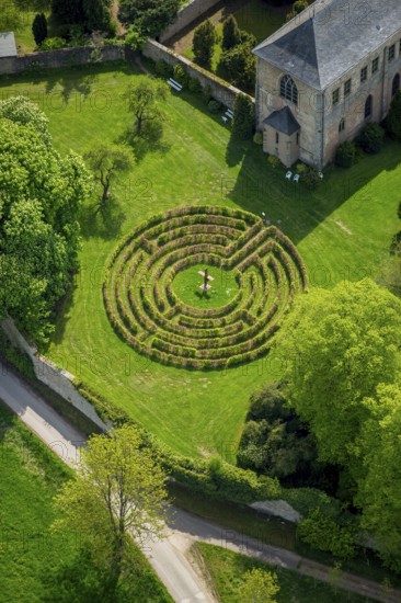 Circle labyrinth at Steinfeld Monastery, monastery in Kall, Benedictine Abbey, Kall, Eifel, North Rhine-Westphalia, Germany, Europe, aerial view, birds-eyes view, aerial photograph, aerial photography, aerial photography, overview, bird's eye view