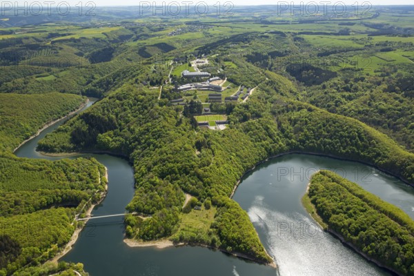 Former Nazi Ordensburg Vogelsang, a building complex erected by the National Socialists on Mount Erpenscheid (1) near Gemünd Eifel above the Urft Dam, Camp Vogelsang former barracks of the Belgian armed forces, Schleiden, Eifel, North Rhine-Westphalia, Germany, Europe, aerial view, birds-eyes view, aerial photography, aerial photography, overview, bird's eye view