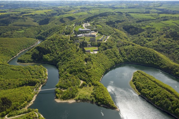 Former Nazi Ordensburg Vogelsang, a building complex erected by the National Socialists on Mount Erpenscheid (1) near Gemünd Eifel above the Urft Dam, Camp Vogelsang former barracks of the Belgian armed forces, Schleiden, Eifel, North Rhine-Westphalia, Germany, Europe, aerial view, birds-eyes view, aerial photography, aerial photography, overview, bird's eye view