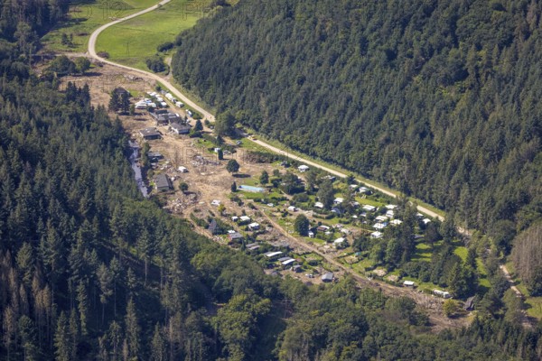 Aerial view, flooded area at the river Ahr and destroyed by flood disaster campsite Sahrtal Ute Vaßmer at the Sahrbach in the district Kreuzberg, Altenahr, Ahr flood, Ahr valley, Rhineland-Palatinate, Germany, camping, camping site, camping houses, camper, campsite, DE, Europe, flood disaster, flood disaster, flood of the century, aerial view, aerial photography, aerial photography, overview, bird's-eye view, motorhome, caravan, birds-eyes view, overview, flooding, flooding, flooded area