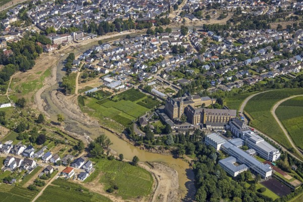 Aerial view, flood area at the river Ahr and Dr. von Ehrenwall's clinic and monastery with Calvarienberg pilgrimage church and Calvarienberg grammar school in Walporzheim, Bad Neuenahr-Ahrweiler, Ahr valley, Rhineland-Palatinate, Germany, Ahr flood, place of worship, DE, Europe, specialised clinic, flood disaster, healthcare, religious community, place of worship, holy site, flood, flood disaster, hospital, flood of the century, church, church community, clinic, clinic centre, monastery, denomination, hospital, hospital, aerial view, aerial photography, aerial photography, medical facility, medical aid, religion, religious site, overview, bird's-eye view, overview, medical care, flooding, flood, flood area