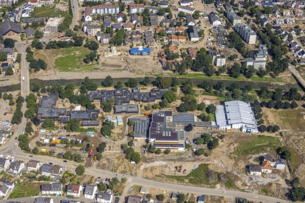Aerial view, flood area at the river Ahr with Levana-Schule Bad Neuenahr-Ahrweiler e.V. and Erich-Kästner-Realschule plus in Bachem, Bad Neuenahr-Ahrweiler, Ahrtal, Rhineland-Palatinate, Germany, Ahrallee, Ahrhochwasser, DE, Europe, flood disaster, flood disaster of the century, aerial view, aerial photography, aerial photography, Pius-Wiese, St.-Pius-Brücke, overview, bird's-eye view, birds-eyes view, overview, flooding, flooding area