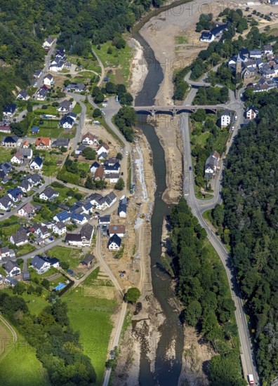Aerial view, flood area at the river Ahr with bridge Kapellenstraße and catholic parish church St. Kunibert in Hönningen, Ahr valley, Rhineland-Palatinate, Germany, Ahr flood, place of worship, bridge, DE, Europe, flood disaster, religious community, place of worship, holy site, flood disaster, Hönningen, flood of the century, church, parish, denomination, aerial photograph, aerial photography, aerial photography, religion, religious site, overview, bird's-eye view, birds-eyes view, overview, flooding, flooding, flooded area