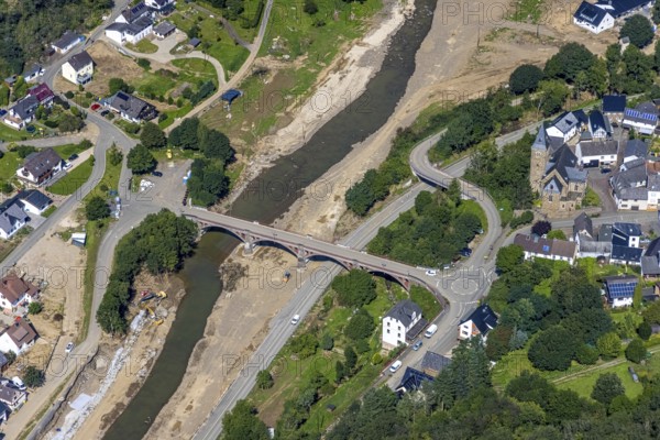 Aerial view, flood area at the river Ahr with bridge Kapellenstraße and catholic parish church St. Kunibert in Hönningen, Ahr valley, Rhineland-Palatinate, Germany, Ahr flood, place of worship, bridge, DE, Europe, flood disaster, religious community, place of worship, holy site, flood disaster, Hönningen, century flood, church, parish, denomination, roundabout, roundabout, aerial view, aerial photography, aerial photography, religion, religious site, overview, bird's-eye view, birds-eyes view, overview, flooding, flood, flood area