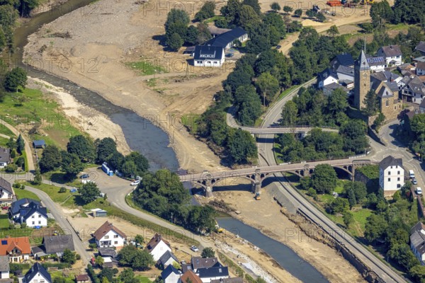 Aerial view, flood area at the river Ahr with bridge Kapellenstraße and catholic parish church St. Kunibert in Hönningen, Ahr valley, Rhineland-Palatinate, Germany, Ahr flood, place of worship, bridge, DE, Europe, flood disaster, religious community, place of worship, holy site, flood disaster, Hönningen, flood of the century, church, parish, denomination, aerial photograph, aerial photography, aerial photography, religion, religious site, overview, bird's-eye view, birds-eyes view, overview, flooding, flooding, flooded area