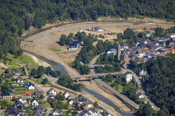 Aerial view, flood area at the river Ahr with bridge Kapellenstraße and catholic parish church St. Kunibert in Hönningen, Ahr valley, Rhineland-Palatinate, Germany, Ahr flood, place of worship, bridge, DE, Europe, flood disaster, religious community, place of worship, holy site, flood disaster, Hönningen, flood of the century, church, parish, denomination, aerial photograph, aerial photography, aerial photography, religion, religious site, overview, bird's-eye view, birds-eyes view, overview, flooding, flooding, flooded area