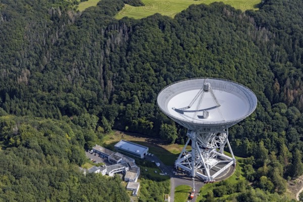 Aerial photograph, Effelsberg radio telescope in the Ahr Mountains in Holzem, Bad Münstereifel, Ahr flood, Ahr Valley, North Rhine-Westphalia, Germany, DE, Eifel part of the Ahr Mountains, Europe, large telescope, cosmos observation, aerial photograph, aerial photography, aerial photography, Max Planck Institute for Radio Astronomy, radio astronomy, radio telescope, overview, bird's-eye view, forest area, space research, birds-eyes view, overview