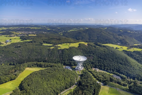 Aerial photograph, Effelsberg radio telescope in the Ahr Mountains in Holzem, Bad Münstereifel, Ahr flood, Ahr Valley, North Rhine-Westphalia, Germany, DE, Eifel part of the Ahr Mountains, Europe, large telescope, cosmos observation, aerial photograph, aerial photography, aerial photography, Max Planck Institute for Radio Astronomy, radio astronomy, radio telescope, overview, bird's-eye view, forest area, space research, birds-eyes view, overview