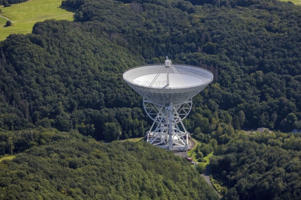 Aerial photograph, Effelsberg radio telescope in the Ahr Mountains in Holzem, Bad Münstereifel, Ahr flood, Ahr Valley, North Rhine-Westphalia, Germany, DE, Eifel part of the Ahr Mountains, Europe, large telescope, cosmos observation, aerial photograph, aerial photography, aerial photography, Max Planck Institute for Radio Astronomy, radio astronomy, radio telescope, overview, bird's-eye view, forest area, space research, birds-eyes view, overview