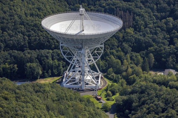 Aerial photograph, Effelsberg radio telescope in the Ahr Mountains in Holzem, Bad Münstereifel, Ahr flood, Ahr Valley, North Rhine-Westphalia, Germany, DE, Eifel part of the Ahr Mountains, Europe, large telescope, cosmos observation, aerial photograph, aerial photography, aerial photography, Max Planck Institute for Radio Astronomy, radio astronomy, radio telescope, overview, bird's-eye view, forest area, space research, birds-eyes view, overview