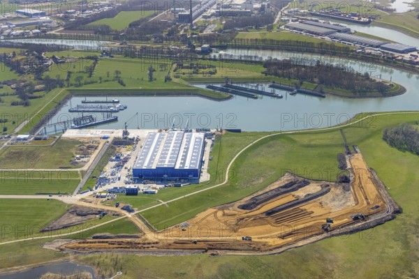 Aerial view, construction site in the Lippe floodplain at the heavy load terminal, Wesel, Ruhr area, Lower Rhine, North Rhine-Westphalia, Germany, construction work, construction area, construction site, building plots, construction project, construction site, DE, Europe, aerial view, aerial photography, aerial photography, overview, bird's eye view, to the Rhine-Lippe harbour, birds-eyes view, overview