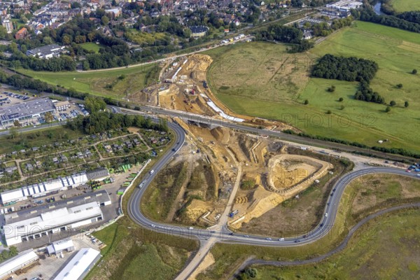 Aerial view, construction site south bypass with renaturalisation of the Lippe estuary in the Lippe estuary nature reserve in the Fusternberg district of Wesel, Lower Rhine, North Rhine-Westphalia, Germany, construction work, construction area, construction site, building plots, construction project, construction project, construction site, DE, Europe, Lippe floodplain, Lippeverband, aerial view, aerial photography, aerial photography, new construction, overview, bird's eye view, Wesel, birds-eyes view, overview, renaturalised river, B58 new, Wesel southern bypass, new road construction, new Lippe estuary