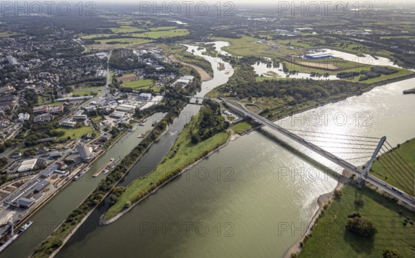 Aerial view, The mouth of the river Lippe into the river Rhine with the Lower Rhine Bridge Wesel at the city harbour in Wesel, Lower Rhine, North Rhine-Westphalia, Germany, federal road B58, DE, Europe, harbour, mouth of the river Lippe, Lippeverband, aerial view, aerial photography, aerial photography, estuary, renaturation of the mouth of the river Lippe, sight, overview, bird's-eye view, Wesel, Weseler Straße, birds-eyes view, overview