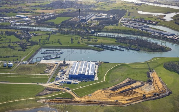 Aerial view, construction site in the Lippe floodplain at the heavy load terminal, Wesel, Ruhr area, Lower Rhine, North Rhine-Westphalia, Germany, construction work, construction area, construction site, building plots, construction project, construction site, DE, Europe, aerial view, aerial photography, aerial photography, overview, bird's eye view, to the Rhine-Lippe harbour, birds-eyes view, overview