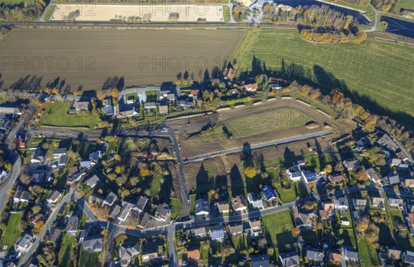 Aerial view, construction area for new housing estate between Ruhrstraße and Höhenweg in the district of Echthausen in Wickede, Sauerland, North Rhine-Westphalia, Germany, construction work, construction area, building site, building plots, construction project, construction site, DE, Europe, aerial view, aerial photography, aerial photography, overview, bird's eye view, Wickede, birds-eyes view, overview