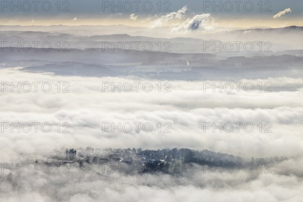 Aerial view, residential area in fog with high-rise building, mobile phone antennas in backlight in Wickede, Sauerland, North Rhine-Westphalia, Germany, mountains, DE, Europe, shapes and colours, backlight, high-rise building, aerial view, aerial photography, aerial photography, fog, overview, bird's-eye view, WEA, Wickede, wind energy, wind energy plant, wind power, wind turbine, wind turbines, clouds, birds-eyes view, overview