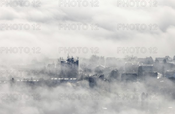 Aerial view, residential area in fog with high-rise building mobile phone antennas in backlight in Wickede, Sauerland, North Rhine-Westphalia, Germany, Europe, shapes and colours, backlight, high-rise building, aerial view, aerial photography, aerial photography, fog, overview, bird's-eye view, clouds, birds-eyes view, overview