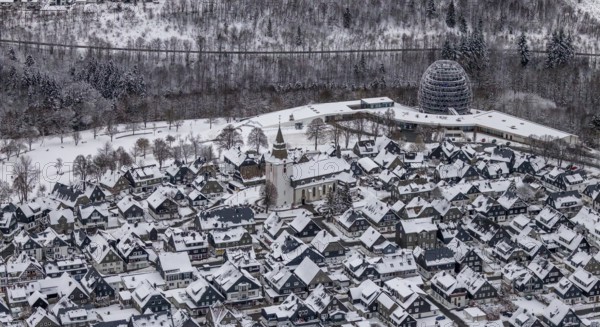 Aerial view of the snowy winter landscape of Winterberg with deserted streets during the corona lockdown in the Sauerland in North Rhine-Westphalia, Germany, Sauerland, Europe, aerial photo, birds-eyes view, aerial photography, aerial photography, overview, bird's eye view, lockdown, closed winter landscape, corona lockdown, deserted, snow, winter weather, corona-related lockdown