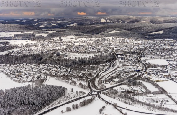 Aerial view of the snowy winter landscape of Winterberg with deserted streets during the corona lockdown in the Sauerland in North Rhine-Westphalia, Germany, Sauerland, Europe, aerial photo, birds-eyes view, aerial photography, aerial photography, overview, bird's eye view, lockdown, closed winter landscape, corona lockdown, deserted, snow, winter weather, corona-related lockdown