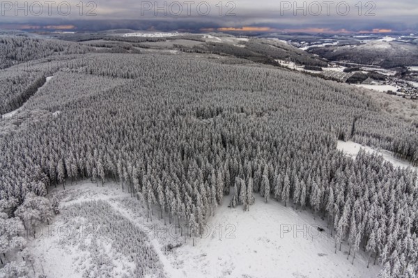 Aerial view of the snowy winter landscape of Winterberg in Sauerland in North Rhine-Westphalia, Germany, Sauerland, Europe, aerial photo, birds-eyes view, aerial photography, aerial photography, overview, bird's eye view, lockdown, closed winter landscape, corona lockdown, deserted, snow, winter weather, corona-related lockdown