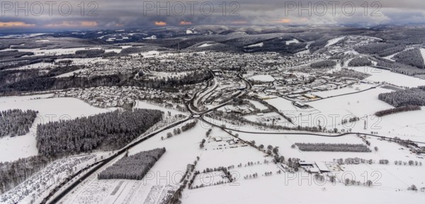 Aerial view of the snowy winter landscape of Winterberg with deserted streets during the corona lockdown in the Sauerland in North Rhine-Westphalia, Germany, Sauerland, Europe, aerial photo, birds-eyes view, aerial photography, aerial photography, overview, bird's eye view, lockdown, closed winter landscape, corona lockdown, deserted, snow, winter weather, corona-related lockdown