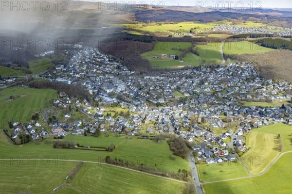 Aerial view, local view, catholic St. Martin church in Wilnsdorf and Protestant church - Protestant parish Rödgen, Siegerland, North Rhine-Westphalia, Germany, place of worship, DE, Europe, religious community, place of worship, holy place, church, parish, denomination, district Siegen-Wittgenstein, aerial view, aerial photography, aerial photography, religion, religious site, overview, bird's-eye view, Wilnsdorf, birds-eyes view, overview